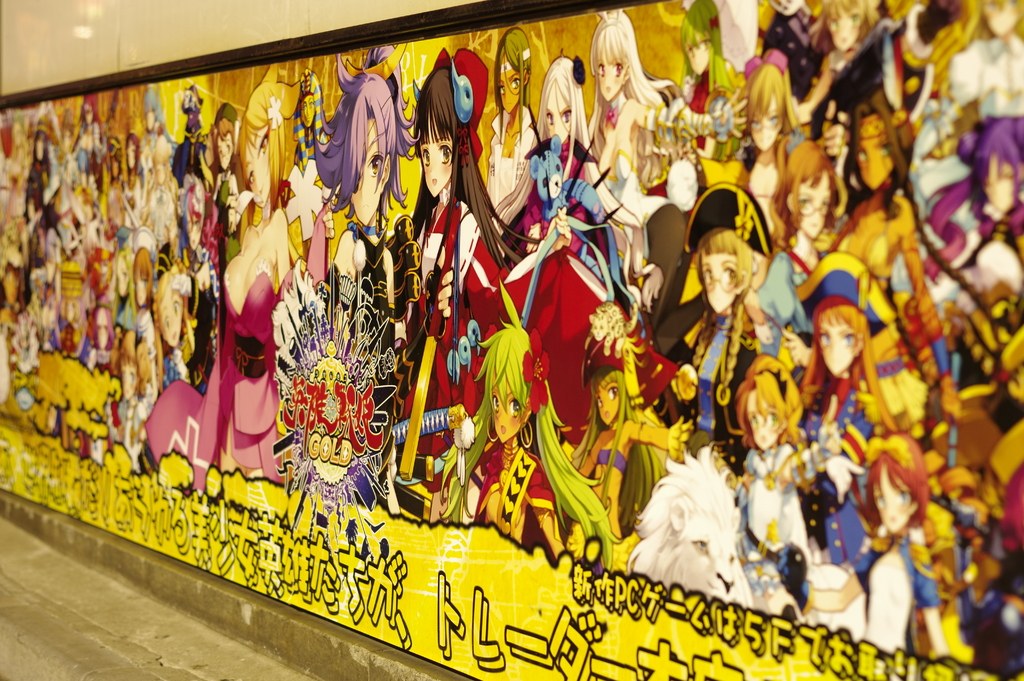 Cartoon character artwork and text on a wall.