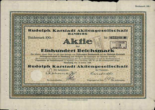 Alte deutsche Banknote mit schwarzem Hintergrund und Text "Rudolph Karlstadt Aktiengesellschaft Hamburg" darauf gedruckt.